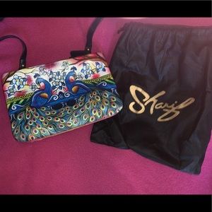 Peacock hand painted by Sharif